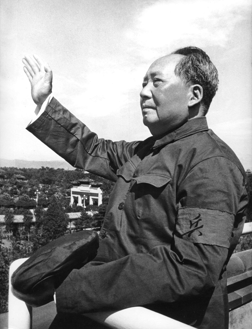 (FILES) This file photo taken on August 18, 1966 shows Chinese leader Mao Zedong reviewing for the first time the armed forces of the "Great Proletarian Cultural Revolution" at the Tiananmen Gate rostrum. Launched by Mao in 1966 to topple his political enemies after the failure of the Great Leap Forward, the Cultural Revolution saw a decade of violence and destruction nationwide as party-led class conflict devolved into social chaos. / AFP PHOTO / STF