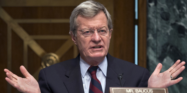 File-This April 17, 2013 file photo Senate Finance Committee Chairman Sen. Max Baucus, D-Mont. questions Health and Human Services Secretary Kathleen Sebelius as she testifies on Capitol Hill before the committee's hearing on President Barack Obama's budget proposal for fiscal year 2014. After warning months ago that a Òtrain wreckÓ was coming in implementing the nationÕs new health care law, Baucus now says he thinks the rollout can get back on track after a bumbling beginning. (AP Photo/J. Scott Applewhite,File)