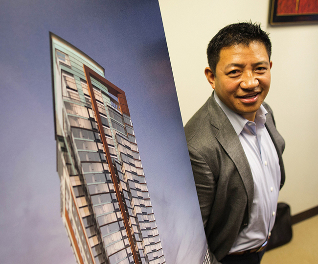 Lobsang Dargey (cq), CEO of Dargey Development and Path America, is seen next to one of his projects in his office on Thursday, November 6, 2014, in Bellevue. 

LOBSANG DARGEY - CEO DARGEY DEVELOPMENT AND PATH AMERICA - 142807 - 110614