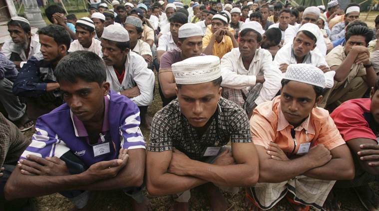"Rohingya boat people wait for their breakfast at a temporary shelter in the Idi Rayeuk district of Indonesia's Aceh province in this February 5, 2009 file photo. Ethnic strife between a tiny Muslim minority and the Buddhist majority threatens to undo the reforms by the new civilian government." *** Local Caption *** "Rohingya boat people wait for their breakfast at a temporary shelter in the Idi Rayeuk district of Indonesia's Aceh province in this February 5, 2009 file photo. Ethnic strife between a tiny Muslim minority and the Buddhist majority threatens to undo the reforms by the new civilian government.   To match Special Report MYANMAR-ROHINGYA. REUTERS"