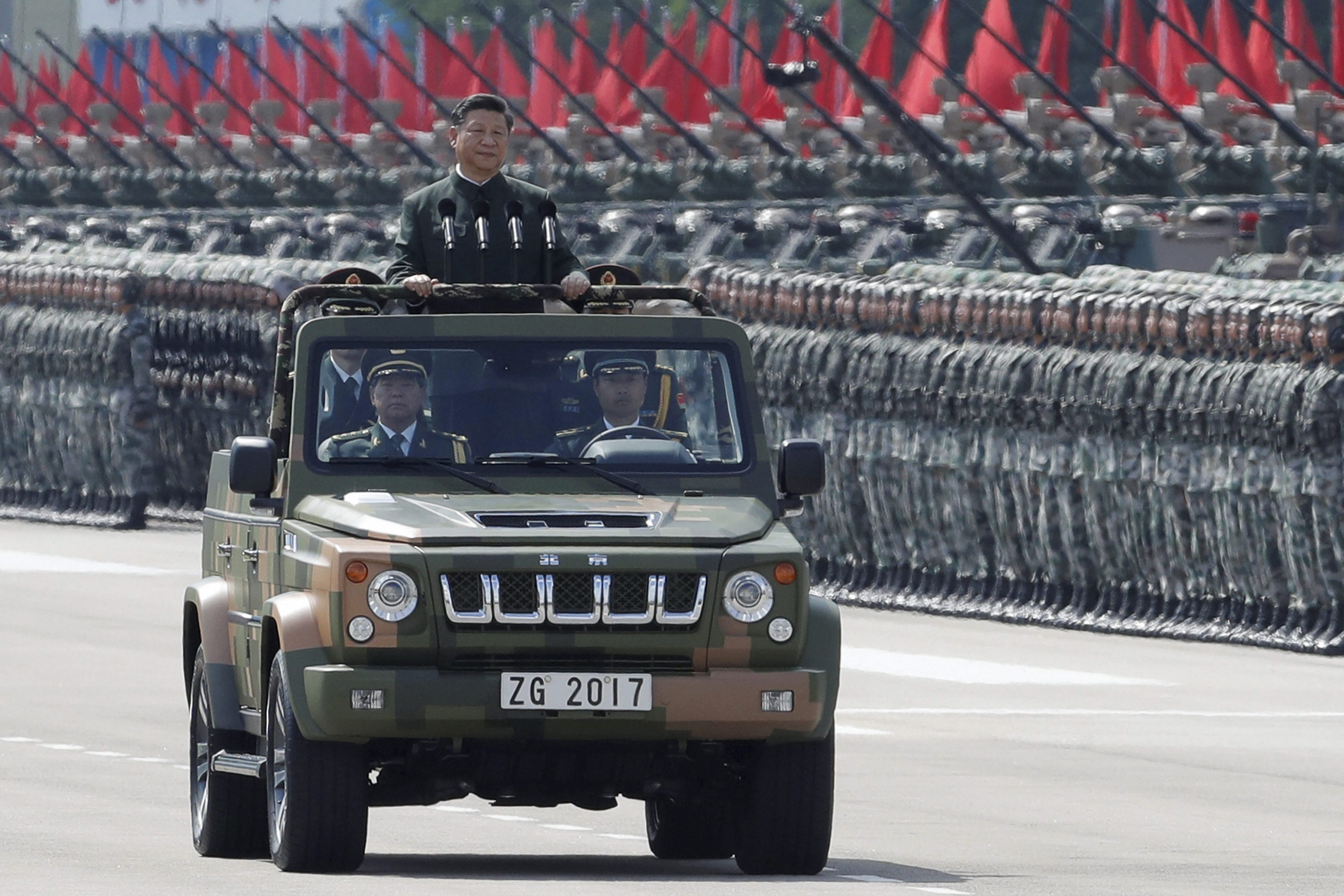 Hong Kong : Chinese President Xi Jinping inspects the People's Liberation Army of the Hong Kong Garrison at the Shek Kong Barracks in Hong Kong, Friday, June 30, 2017. Chinese President Xi Jinping landed in Hong Kong Thursday to mark the 20th anniversary of Beijing taking control of the former British colony, accompanied by a formidable layer of security as authorities showed little patience for pro-democracy protests. AP/PTI(AP6_30_2017_000021B)