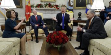 President Donald Trump and Vice President Mike Pence meet with Senate Minority Leader Chuck Schumer, D-N.Y., and House Minority Leader Nancy Pelosi, D-Calif., in the Oval Office of the White House, Tuesday, Dec. 11, 2018, in Washington. (AP Photo/Evan Vucci)