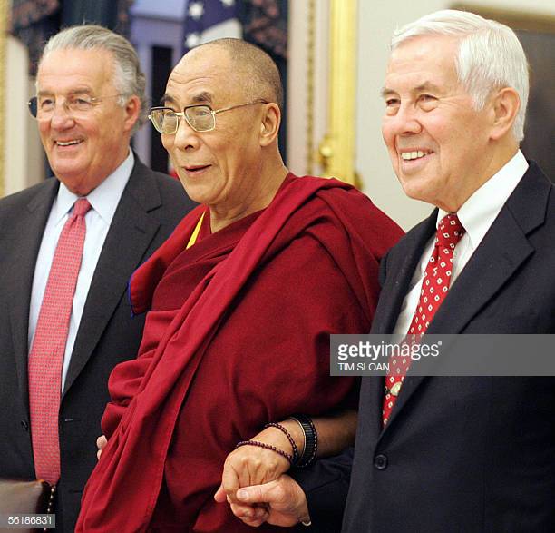 Washington, UNITED STATES:  The Dalai Lama (C), the Tibetan spiritual leader, stands with US Senate Foreign Relations Committee chairman Senator Richard Lugar (R), R-IN, and ranking member Senator Paul Sarbanes, D-MD, as he meets with the committee 16 November 2005 on Capitol Hill in Washington. The Dalai Lama, who arrived here 08 November on a high-profile 10-day visit that included talks with US President George W. Bush and Secretary of State Condoleezza Rice, is spending the day at the US Capitol to meet with congressional leaders.   AFP PHOTO/Tim SLOAN  (Photo credit should read TIM SLOAN/AFP/Getty Images)
