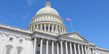 Washington DC, United States landmark. National Capitol building with US flag.