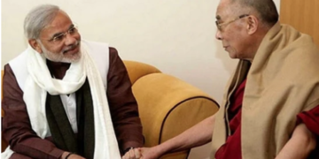 Prime Minister Narendra Modi with Tibetan spiritual leader H.H The Dalai Lama.