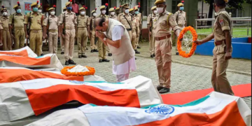 Assam CM Himanta Biswa Sarma lays wreath and pays tribute to six Assam police personnel who lost their lives in Assam-Mizoram border clash, at SP office in Cachar district, on July 27, 2021; (PTI Photo)