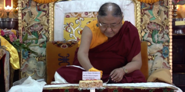 HH the Sakya Gongma Trichen Rinpoche cutting Birthday Cakes.