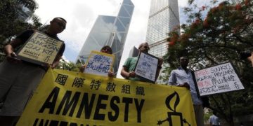 Amnesty International said its local office in Hong Kong would close this month while its regional office will close by the end of the year. (AFP)