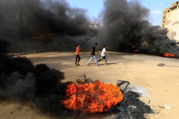 Protesters burning tires in Khartoum, Sudan, after the military detained civilian leaders on Monday.
— Getty Images