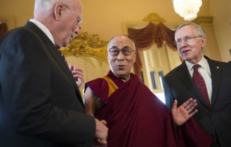 The His Holiness the Dalai Lama with Majority Leader Harry Reid and Senator Patrick Leahy.