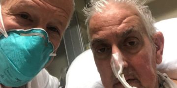 Surgeon Bartley P Griffith pictured with David Bennett earlier this month. Photo/BBC