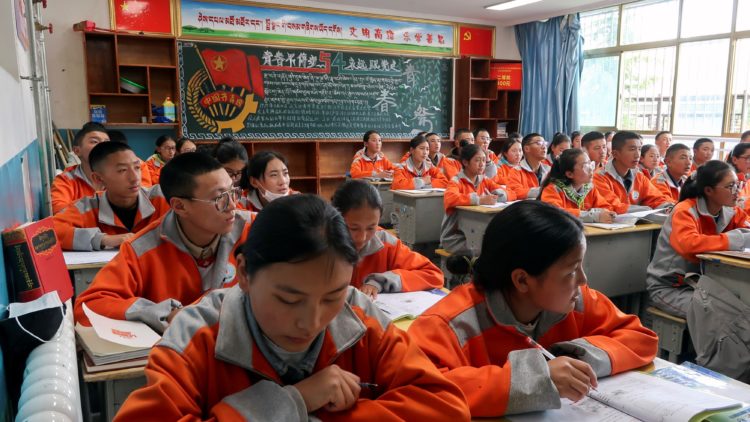 Students attend class at Lhasa Naqu Second Senior High School in Lhasa.   © Reuters