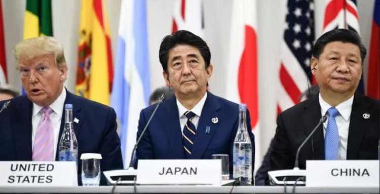 President Donald Trump, Japanese Prime Minister Abe Shinzo and Chinese President Xi Jinping attend a meeting at the G20 Summit in Osaka, June 28, 2019. Photo: Brendan Smialowski/AFP/GETTY IMAGES