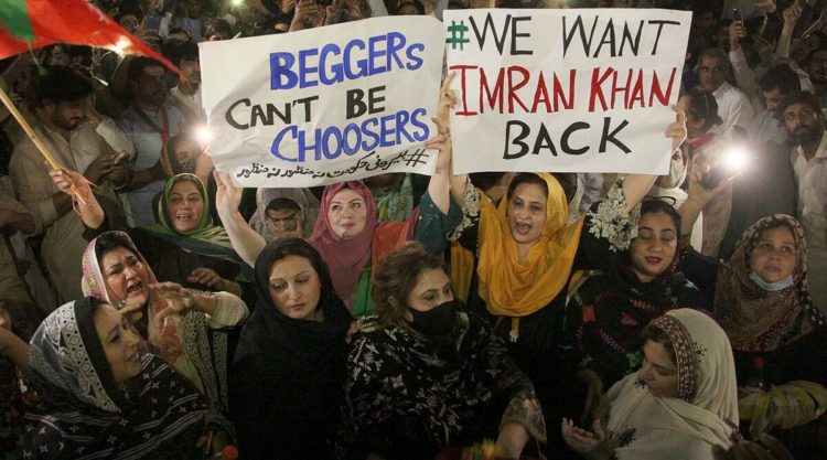 Supporters of ousted Prime Minister Imran Khan's party take part in a rally in Peshawar on Sunday. (Photo: AP)