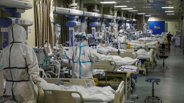 Covid-19 patients in the intensive care unit of a Wuhan hospital after the virus outbreak in the Chinese city in February © REUTERS