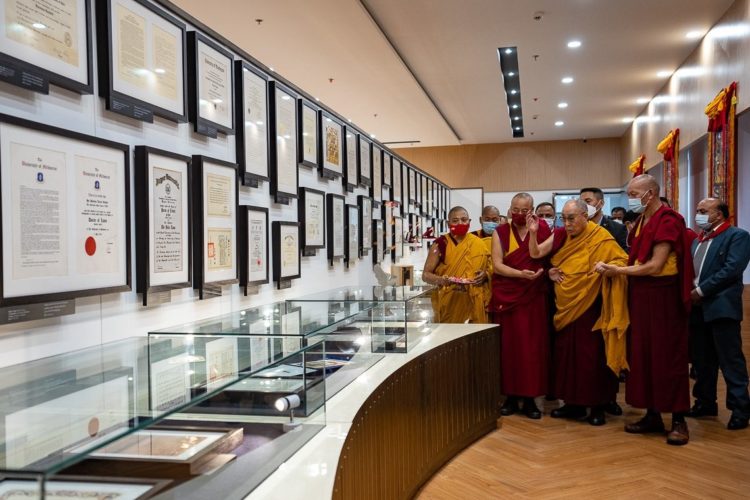 His Holiness the Dalai Lma looking at some of the awards and certificates he received displayed in the gallery at the new Dalai Lama Library and Archive in Dharamsala, HP,  India on July 6, 2022. Photo by Tenzin Choejor