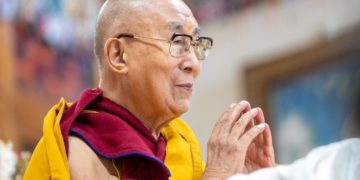 His Holiness the Dalai Lama listening to the performance by students and staff from the THF and CST Mussoorie during the long life prayer. Photo / Tenzin Choejor / OHHDL