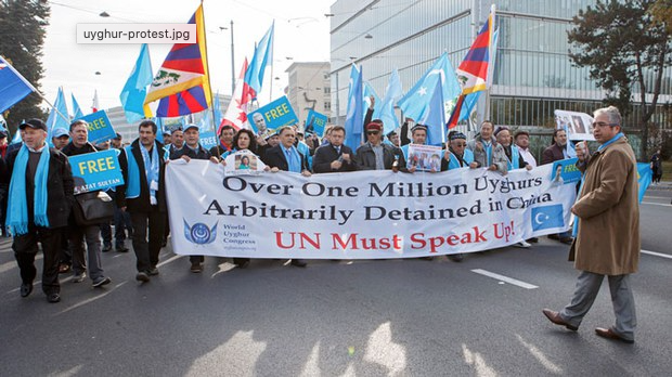 Uyghur protesters and supporters rally in front of the UN Headquarters in Geneva during the Universal Periodic Review of China's human rights record, Nov. 6, 2018.