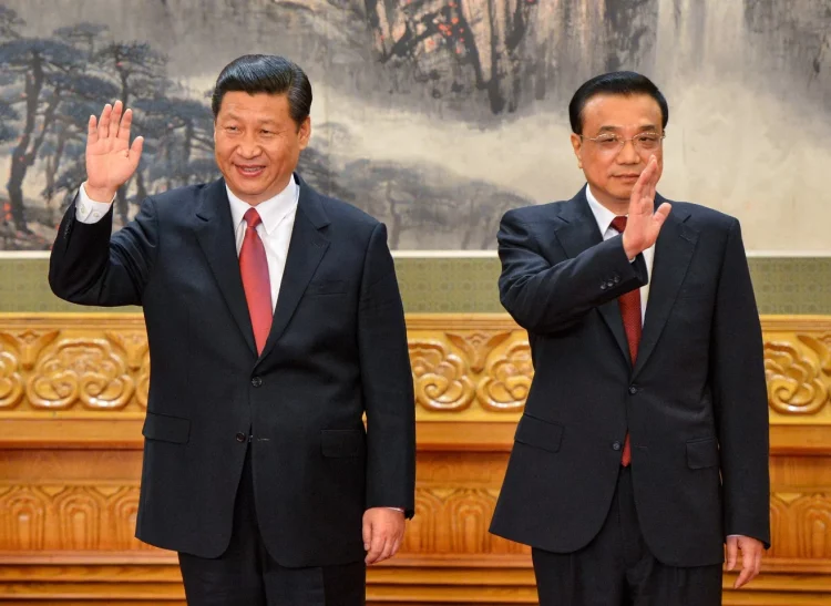 China’s then-vice president Xi Jinping and vice premier Li Keqiang wave to the press in 2012. Photo: AFP