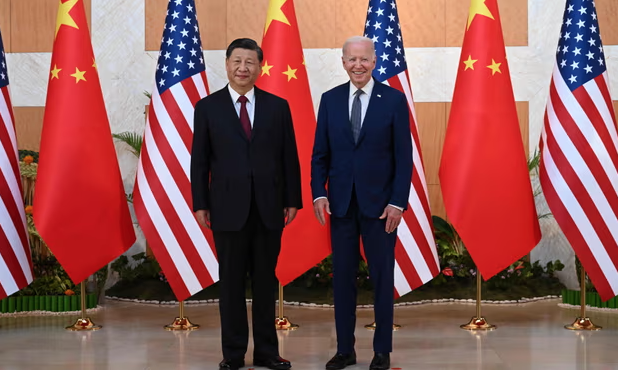 US President Joe Biden and China's President Xi Jinping meet Bali on 14 November 2022. Photograph: Saul Loeb/AFP/Getty Images