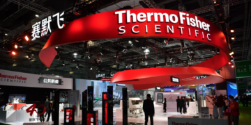 People visit Thermo Fisher booth during the 5th China International Import Expo on November 5, 2022 in Shanghai, China. Photo: VCG/VCG via Getty Images.