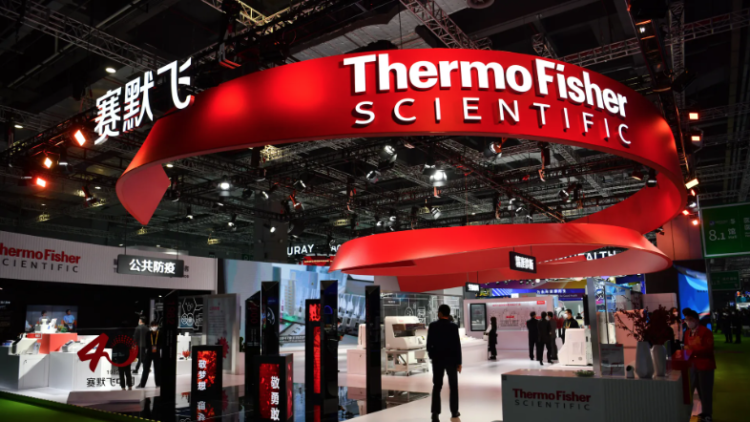 People visit Thermo Fisher booth during the 5th China International Import Expo on November 5, 2022 in Shanghai, China. Photo: VCG/VCG via Getty Images.