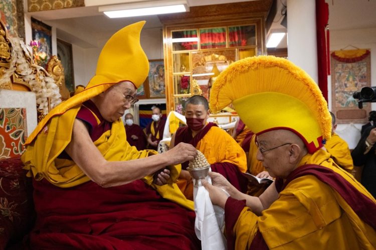 The abbot of Namgyal Monastery Thomthog Rinpoche offering long life pills to His Holiness the Dalai Lama during the Long Life Prayer Offering at His Holiness’s residence in Dharamsala, HP, India on February 14, 2024, Photo by Ven Zamling Norbu