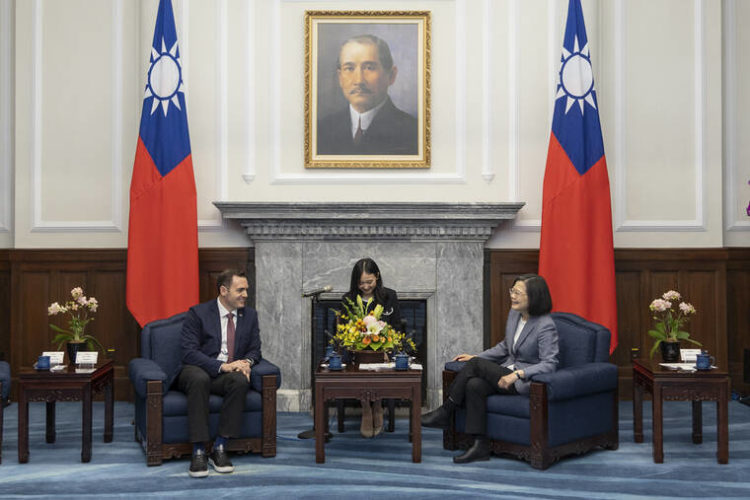 In this photo released by the Taiwan Presidential Office, Taiwan’s President Tsai Ing-wen, right, talks to Rep. Mike Gallagher, the Republican chair of the House Select Committee on the Chinese Communist Party, left, in Taipei, Taiwan.