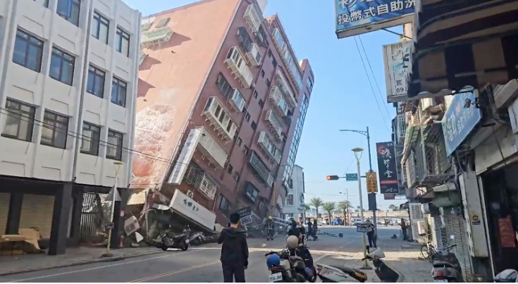 In this image taken from a video run by TVBS, a partially collapsed building is seen in Hualien, eastern Taiwan on Wednesday, April 3. TVBS/AP
