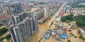 This aerial photo taken on April 22, 2024 shows a general view of flooded buildings and streets after heavy rains in Qingyuan city, in China’s southern Guangdong province. | Photo Credit: AFP