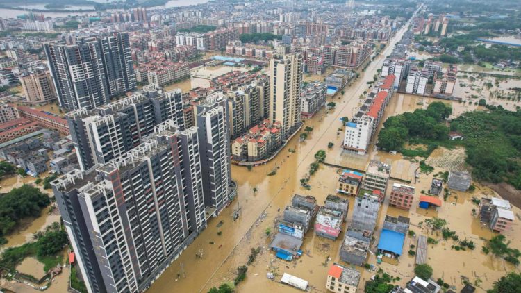 This aerial photo taken on April 22, 2024 shows a general view of flooded buildings and streets after heavy rains in Qingyuan city, in China’s southern Guangdong province. | Photo Credit: AFP