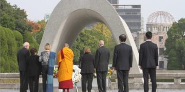 His Holiness the Dalai Lama along with fellow Nobel Laureates paying respect at the Hiroshima Peace Memorial in Hiroshima, Japan on November 14th, 2010. Photo/Taikan Usui