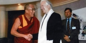 His Holiness the Dalai Lama and President Jimmy Carter together in 2002.