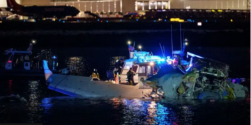 Emergency response units assess wreckage in the Potomac River early Thursday morning. Andrew Harnik/Getty Images