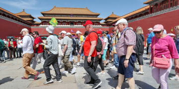 A group of foreign tourists takes in the Palace Museum in Beijing, on April 7, 2024. (PROVIDED TO CHINA DAILY)