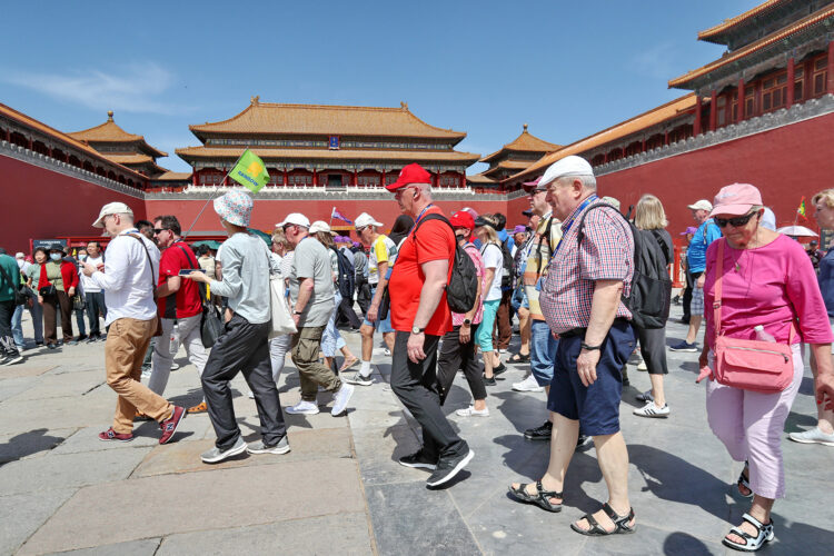 A group of foreign tourists takes in the Palace Museum in Beijing, on April 7, 2024. (PROVIDED TO CHINA DAILY)