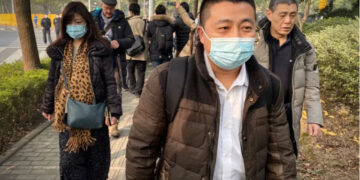 Ren Quanniu said the Henan Provincial Justice Department revoked his licence over comments he made in court in a 2018 case [File: Leo Ramirez/ AFP]