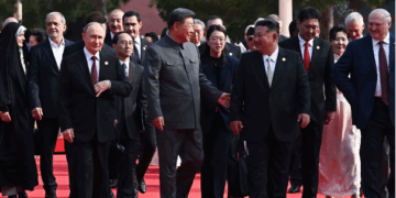 Vladimir Putin, Xi Jinping and Kim Jong Un arrive with heads of other foreign delegations at Tiananmen Square on Wednesday.Sergey Bobylev/Sputnik/AP