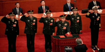 Zhang Youxia (front), newly-elected Vice Chairman of the Central Military Commission of the People's Republic of China, swears an oath with members of the Central Military Commission (L-R) Zhang Shengmin, Liu Zhenli, He Weidong, Li Shangfu, and Miao Hua, after they were elected during the fourth plenary session of the National People's Congress (NPC) at the Great Hall of the People in Beijing. photo credit: Reuter
