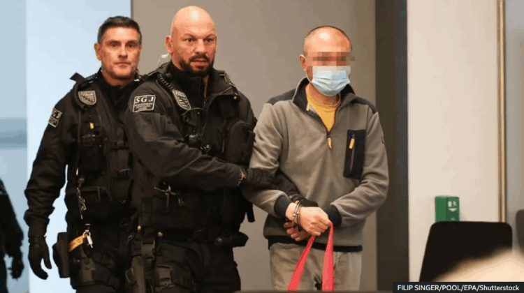 Jian Guo (R) had denied spying for China during his trial