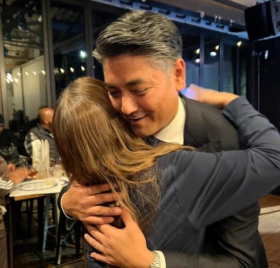 Aftab Pureval accepts congratulations following his reelection as Mayor of Cincinnati. Photo by Xiaojie Zavon