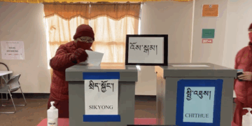 Screengrab of a Tibetan monk in Minnesota, US casting his vote for the Tibetan presidential and parliamentary election in 2021