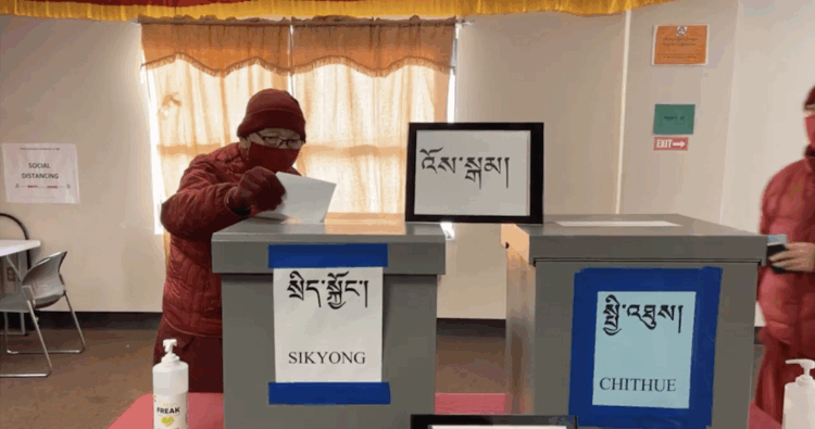 Screengrab of a Tibetan monk in Minnesota, US casting his vote for the Tibetan presidential and parliamentary election in 2021