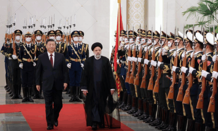 Iranian President Ebrahim Raisi (L) being welcomed by Chinese President Xi Jinping (R) in Beijing, China on February 14, 2023. (Photo by Presidency of Iran / Handout/Anadolu Agency via Getty Images