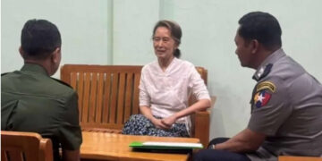 Myanmar state TV
State TV broadcast a picture of the Nobel laureate in confinement