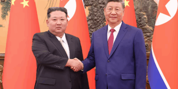 1 Chinese President Xi Jinping and Democratic People's Republic of Korea (DPRK) leader Kim Jong Un shake hands at the Great Hall of the People in Beijing, China September 4, 2025. China Daily via REUTERS