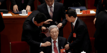 Former Chinese Premier Zhu Rongji (C) leaves after the opening of the 19th National Congress of the Communist Party of China at the Great Hall of the People in Beijing, China October 18, 2017. REUTERS/Jason Lee