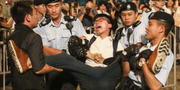 Joshua Wong gets arrested by the police after protesting along with other activists at the Golden Bauhinia for the release of Liu Xiaobo at the Hong Kong Convention and Exhibition Centre in Wan Chai. 28JUN17 SCMP / David Wong